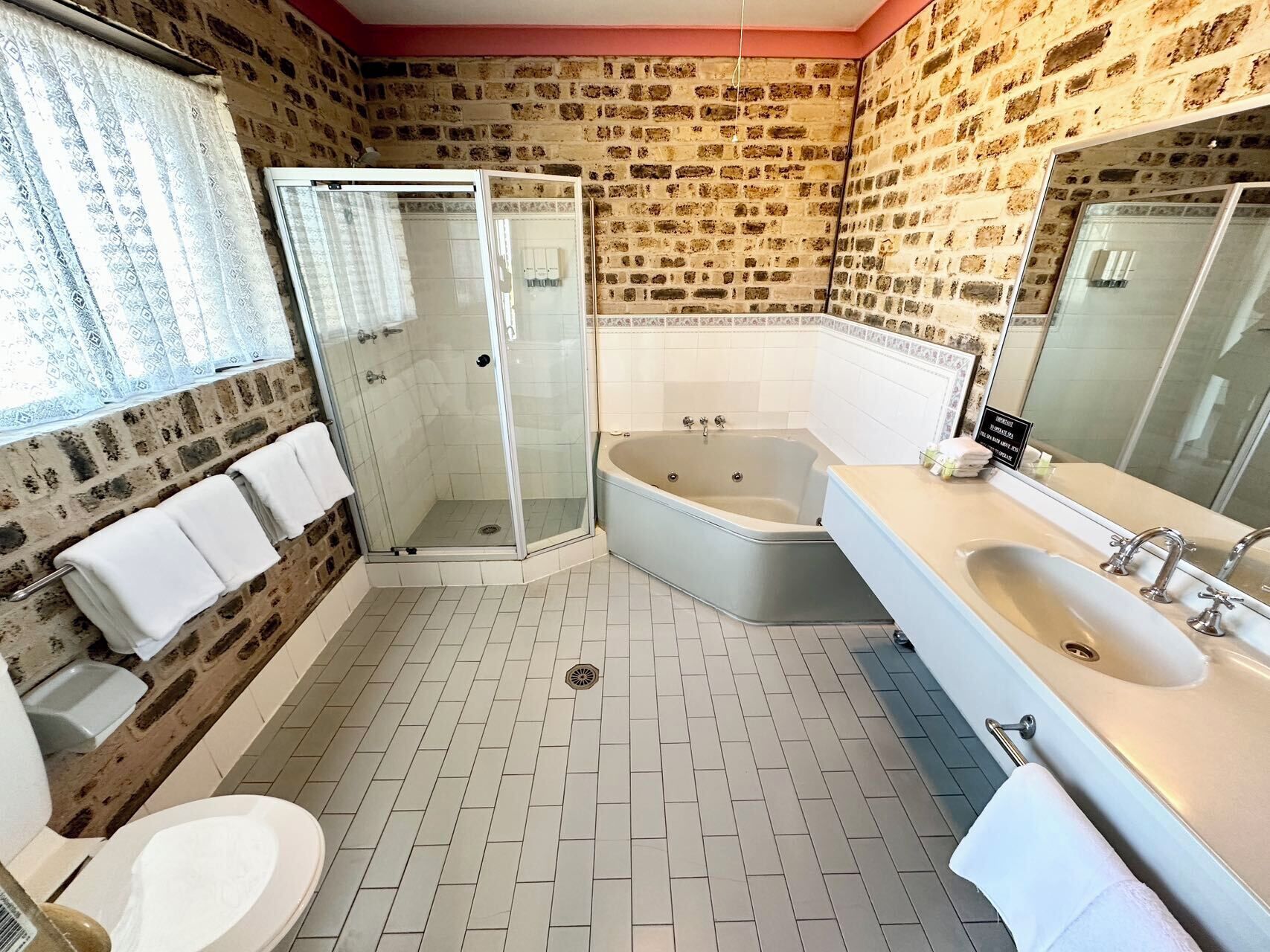 executive 2 bedroom family room  | bathroom | hair dryer, towels