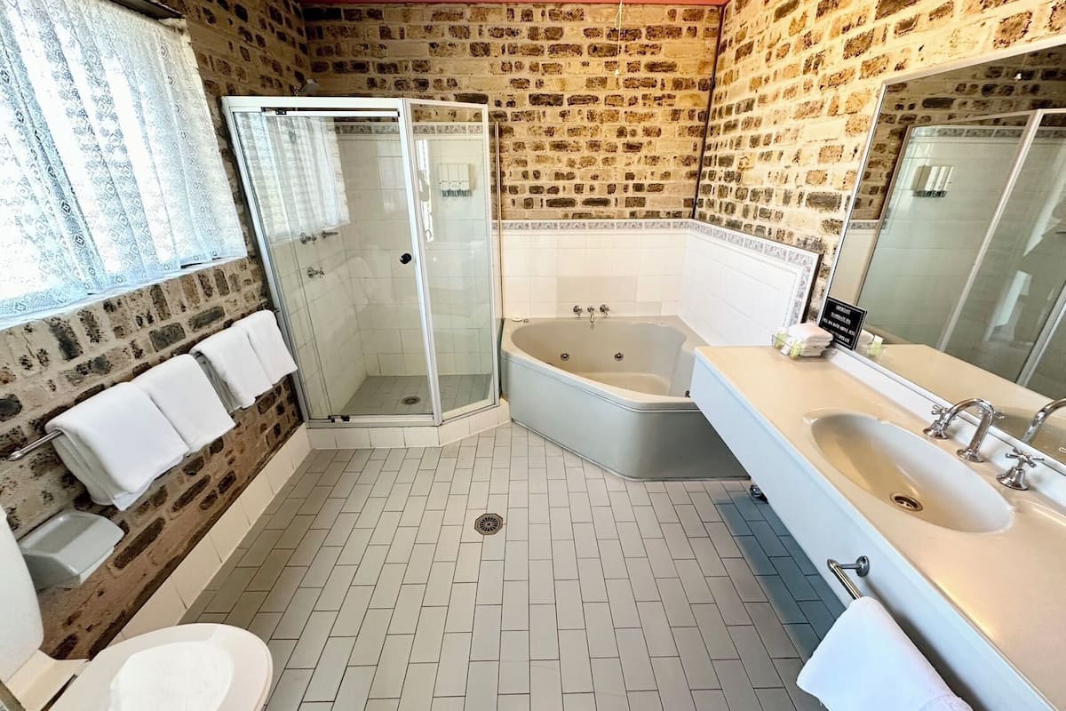 executive 2 bedroom family room  | bathroom | hair dryer, towels