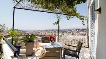 Triple Room, Terrace, City View | Desk, iron/ironing board, free WiFi, bed sheets