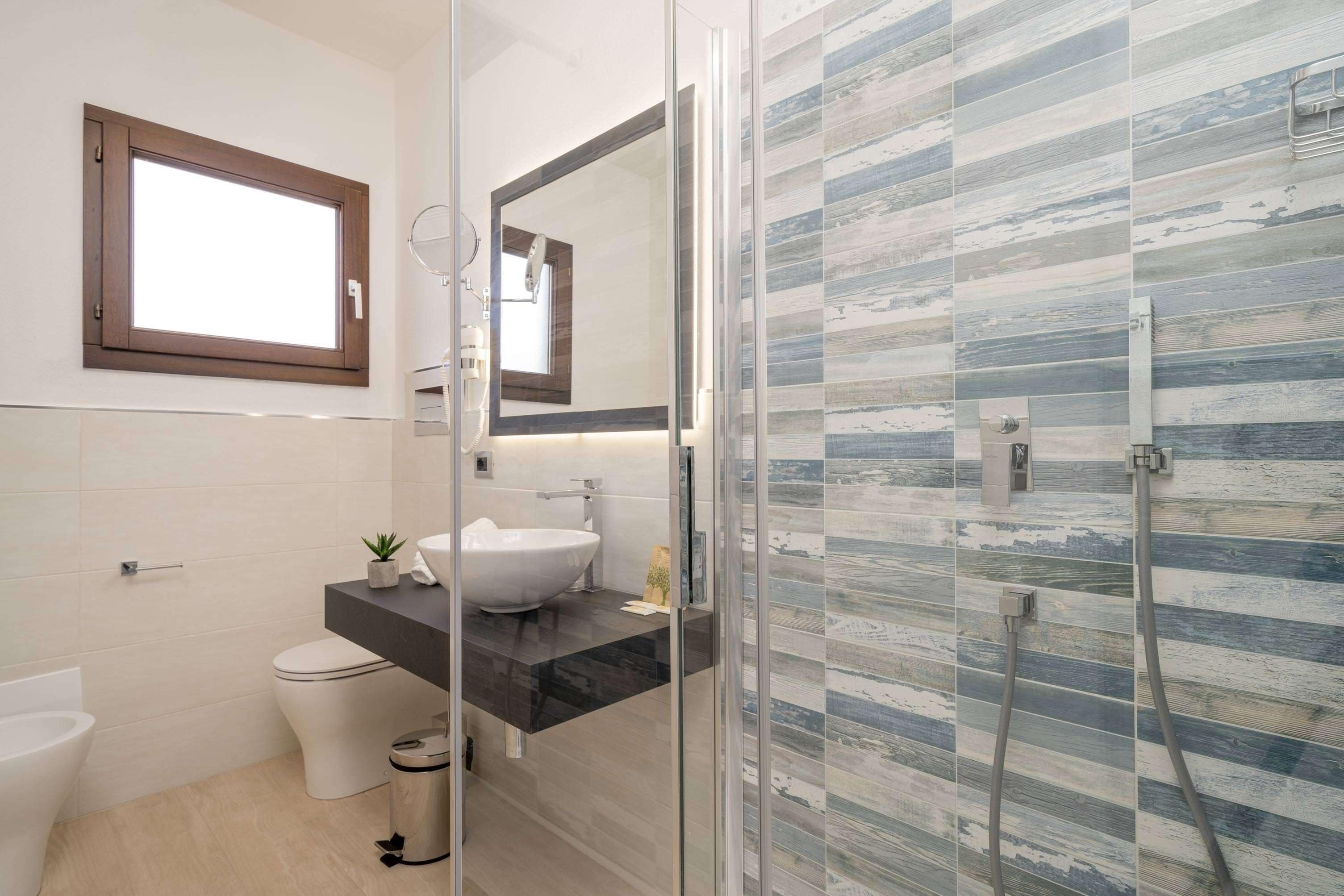 free toiletries, hair dryer, bidet, towels