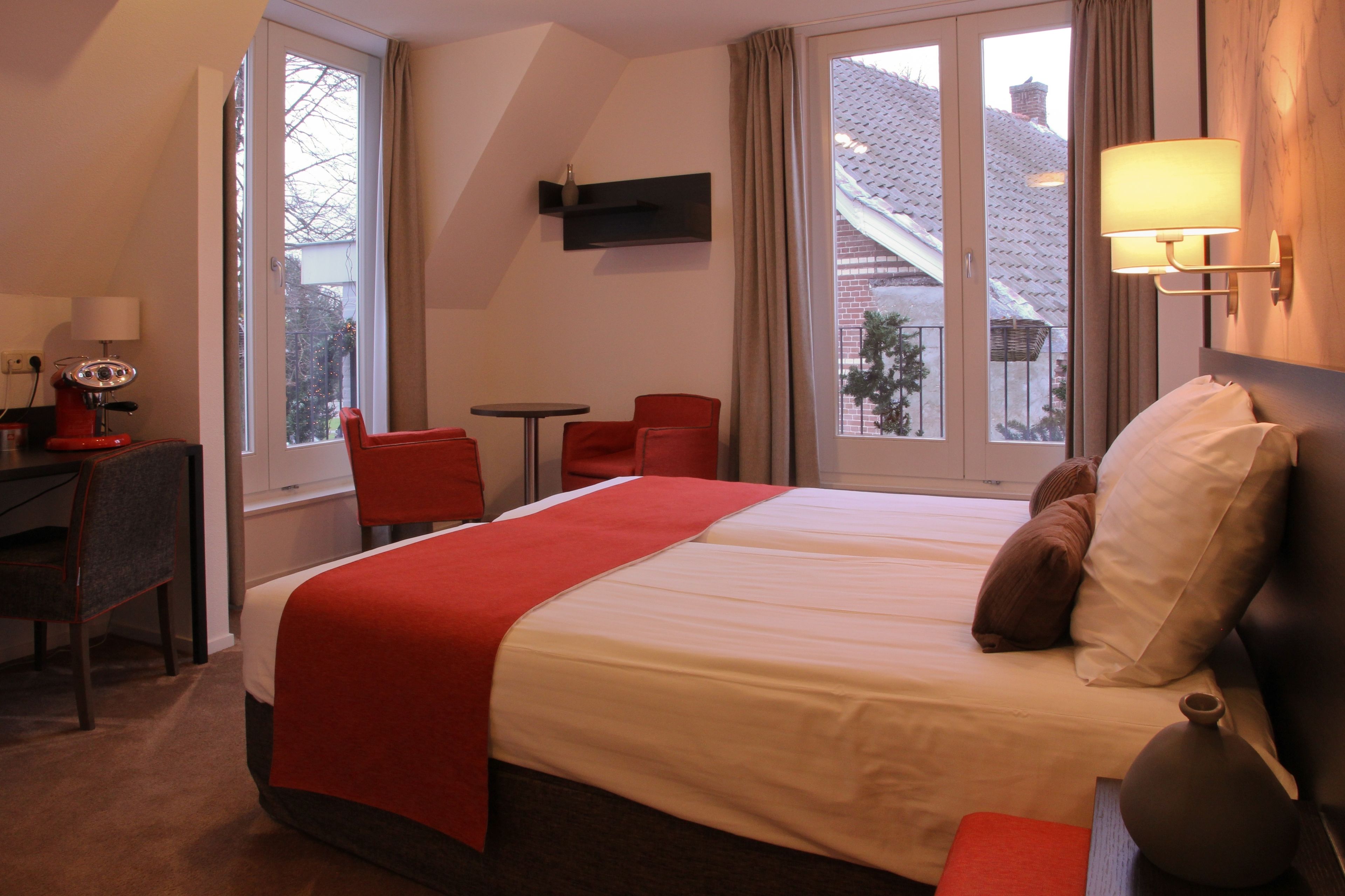 Suite | Een kluis op de kamer, een bureau, gratis wifi, beddengoed