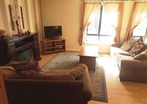 Standard-Apartment, 2 Schlafzimmer | Wohnbereich