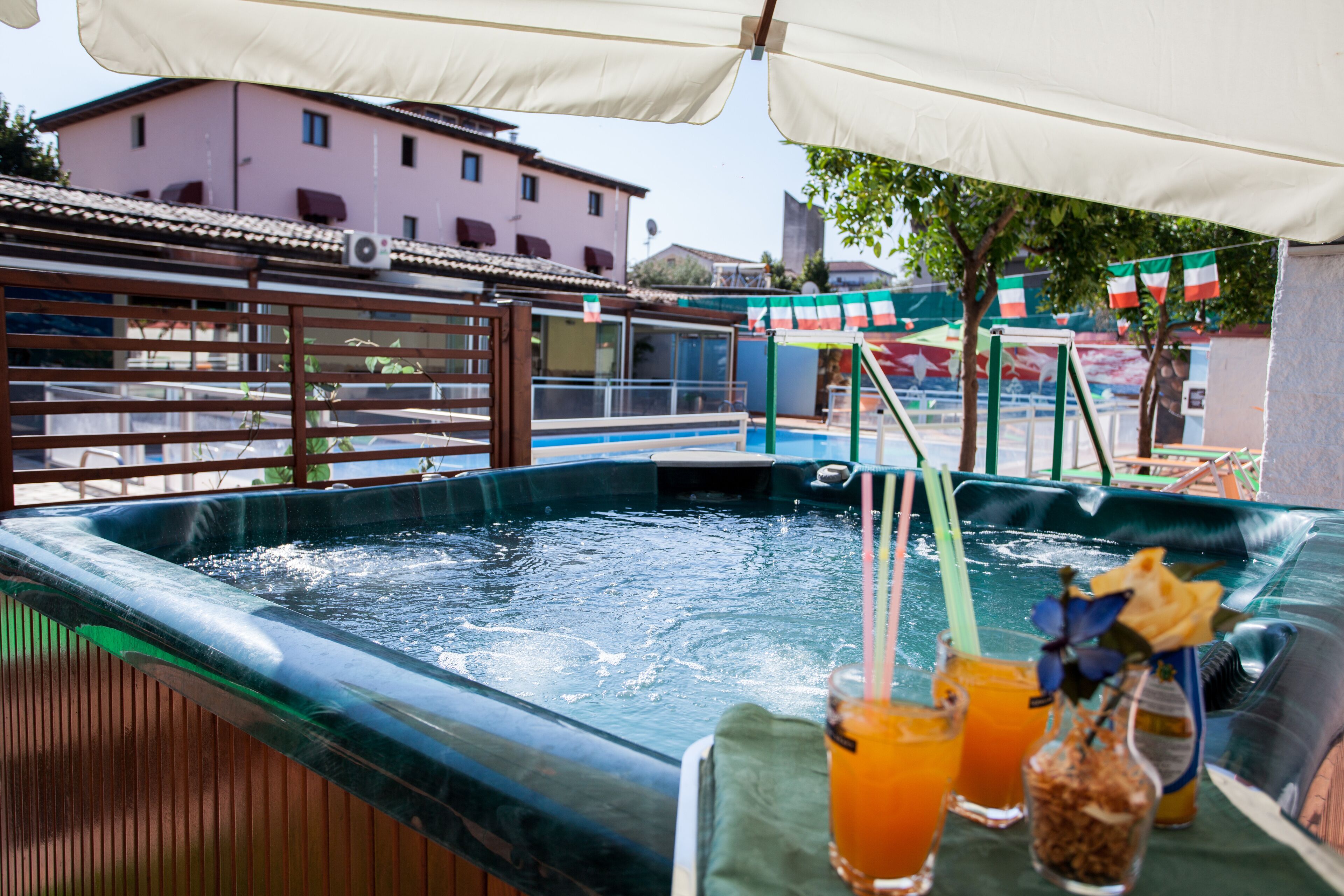 seasonal outdoor pool, pool umbrellas, pool loungers