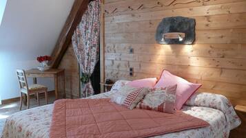 Desk, blackout curtains, free cots/infant beds, rollaway beds