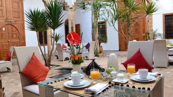 Breakfast, lunch, dinner served; Moroccan cuisine, al fresco dining