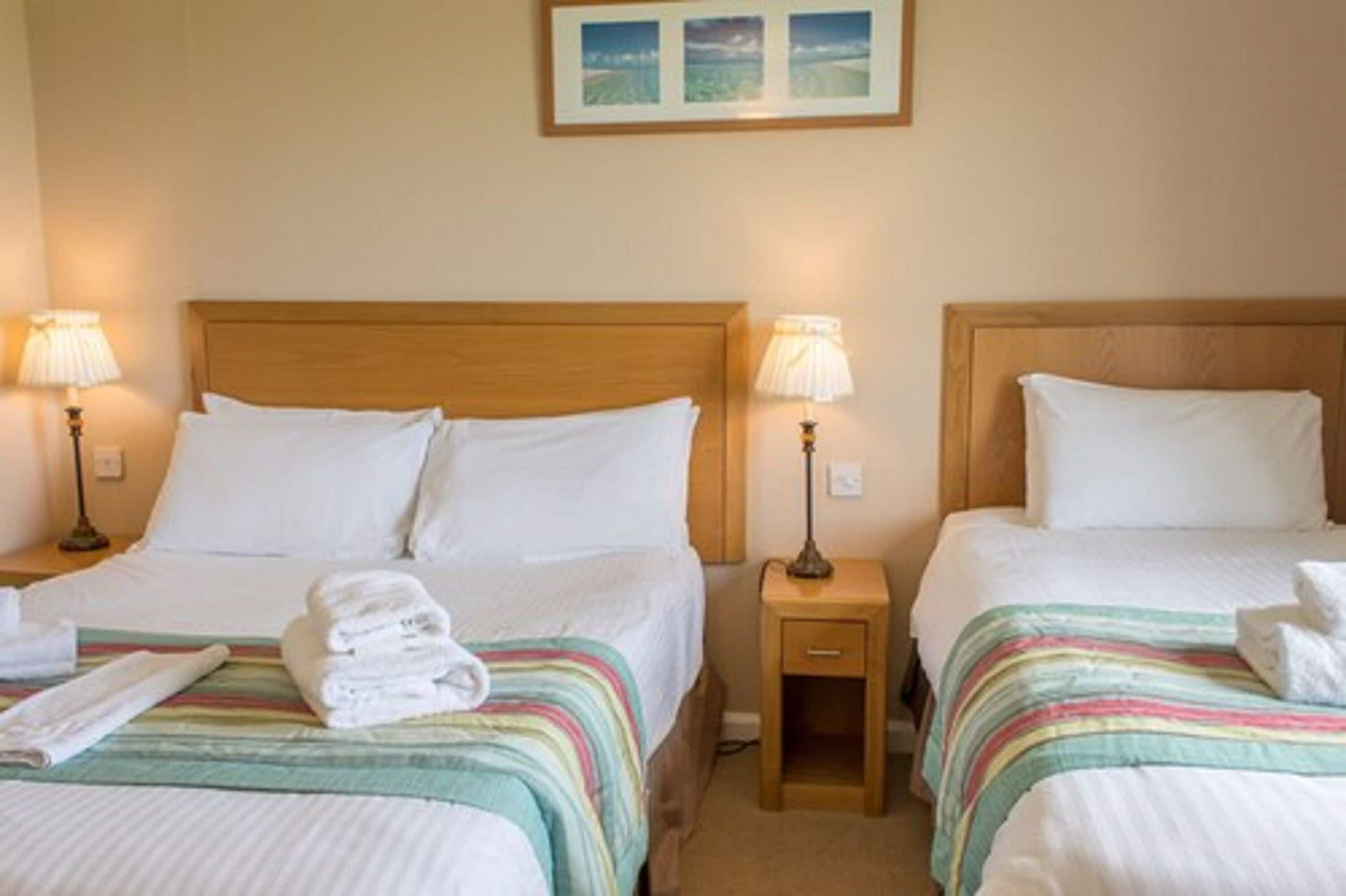 family room (for 3) | desk, iron/ironing board, free wifi, bed sheets