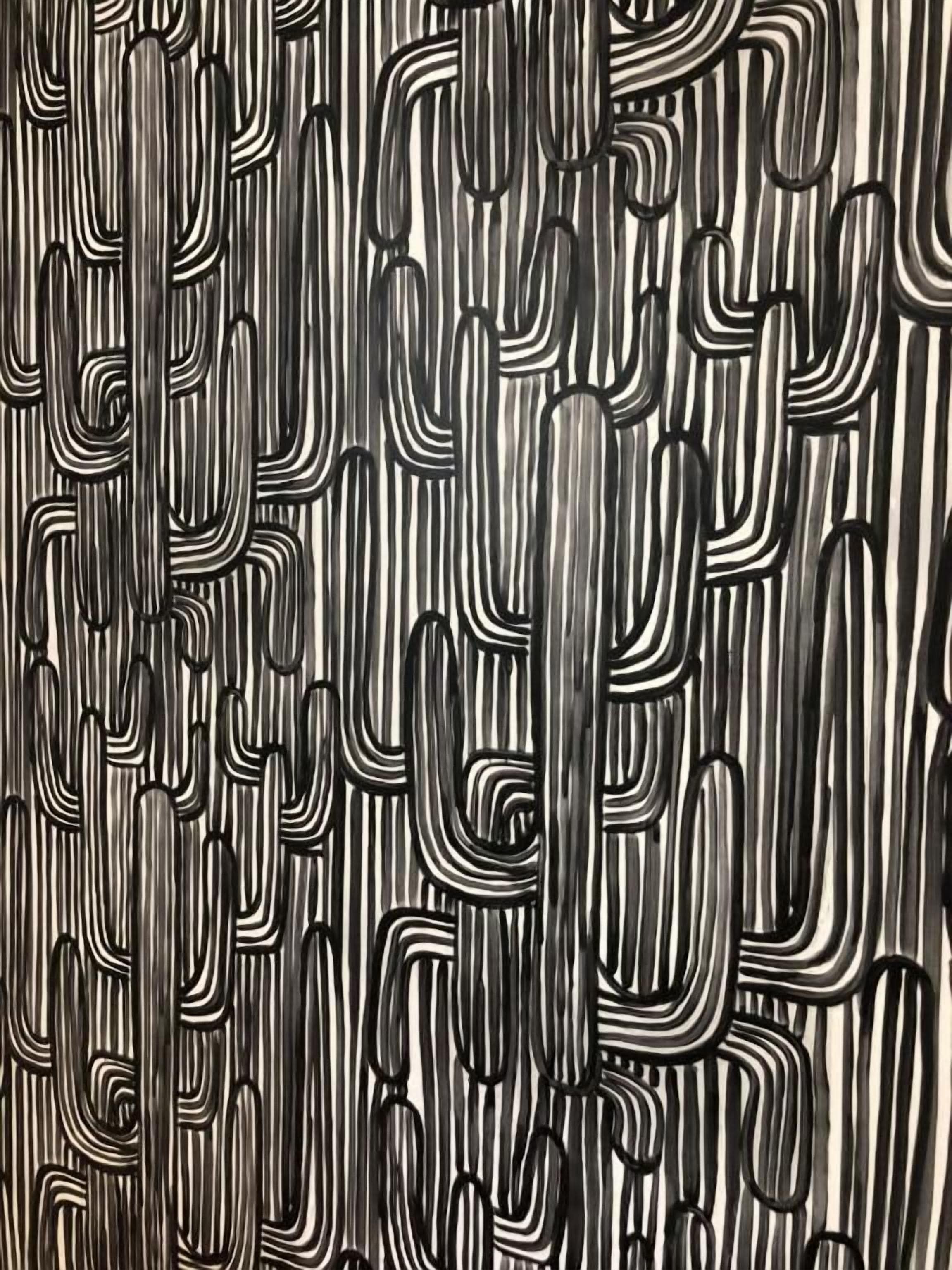 Un diseño de líneas verticales y formas, probablemente un revestimiento de pared o papel tapiz.