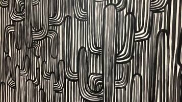 Un diseño de líneas verticales y formas, probablemente un revestimiento de pared o papel tapiz.