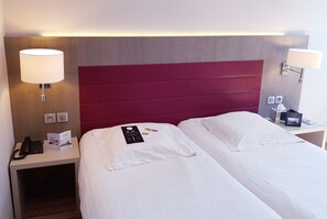 Premium bedding, desk, blackout curtains, soundproofing