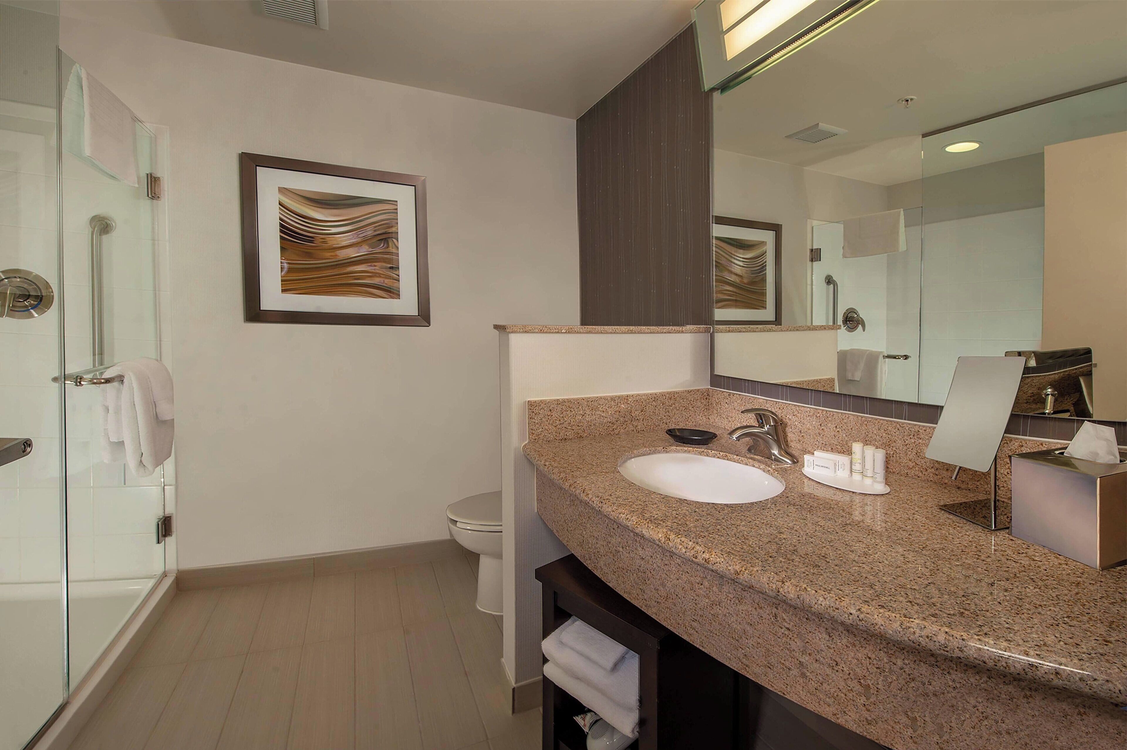 room, 1 king bed with sofa bed | bathroom | free toiletries, hair dryer, towels