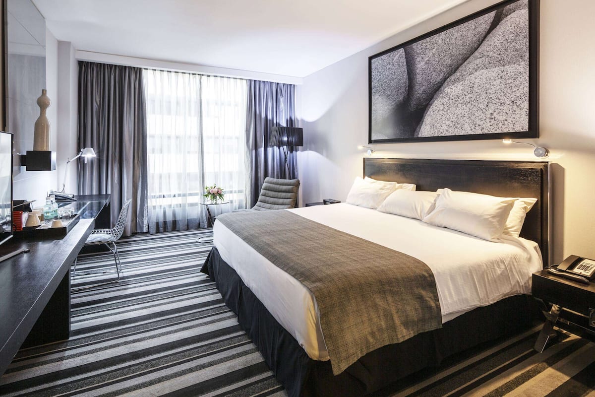 Zimmer, 1 King-Bett, Nichtraucher, Gartenblick | Hochwertige Bettwaren, Daunenbettdecken, Pillowtop-Betten, Minibar