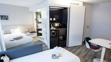 Superior Suite, Multiple Beds | 1 bedroom, in-room safe, desk, laptop workspace