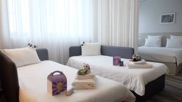 Superior Suite, Multiple Beds | 1 bedroom, in-room safe, desk, laptop workspace