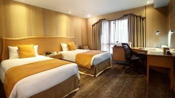 Premium bedding, down duvets, in-room safe, desk