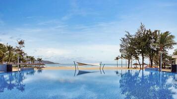 Outdoor pool, open 5:00 AM to 9:00 PM, pool umbrellas, pool loungers