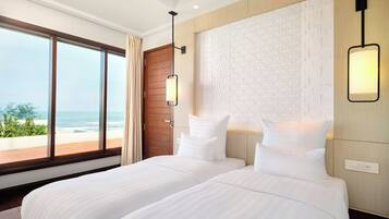 Family Suite, 2 Bedrooms | Minibar, in-room safe, desk, laptop workspace