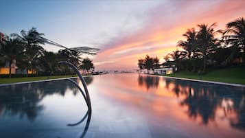 Outdoor pool, open 5:00 AM to 9:00 PM, pool umbrellas, sun loungers