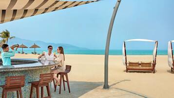 2 bars/lounges, poolside bar, beach bar