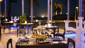 2 bars/lounges, poolside bar, beach bar