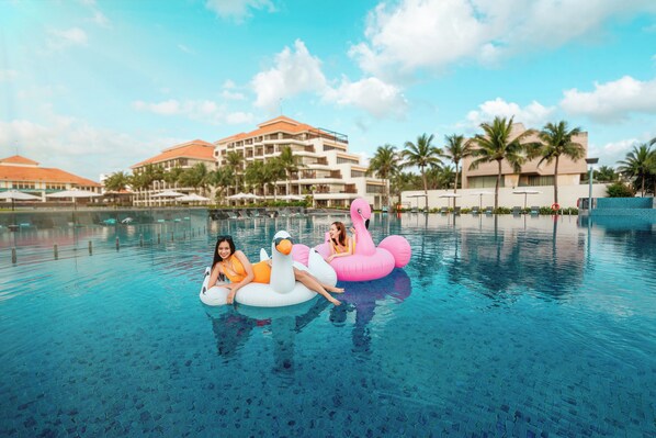Outdoor pool, open 5:00 AM to 9:00 PM, pool umbrellas, sun loungers