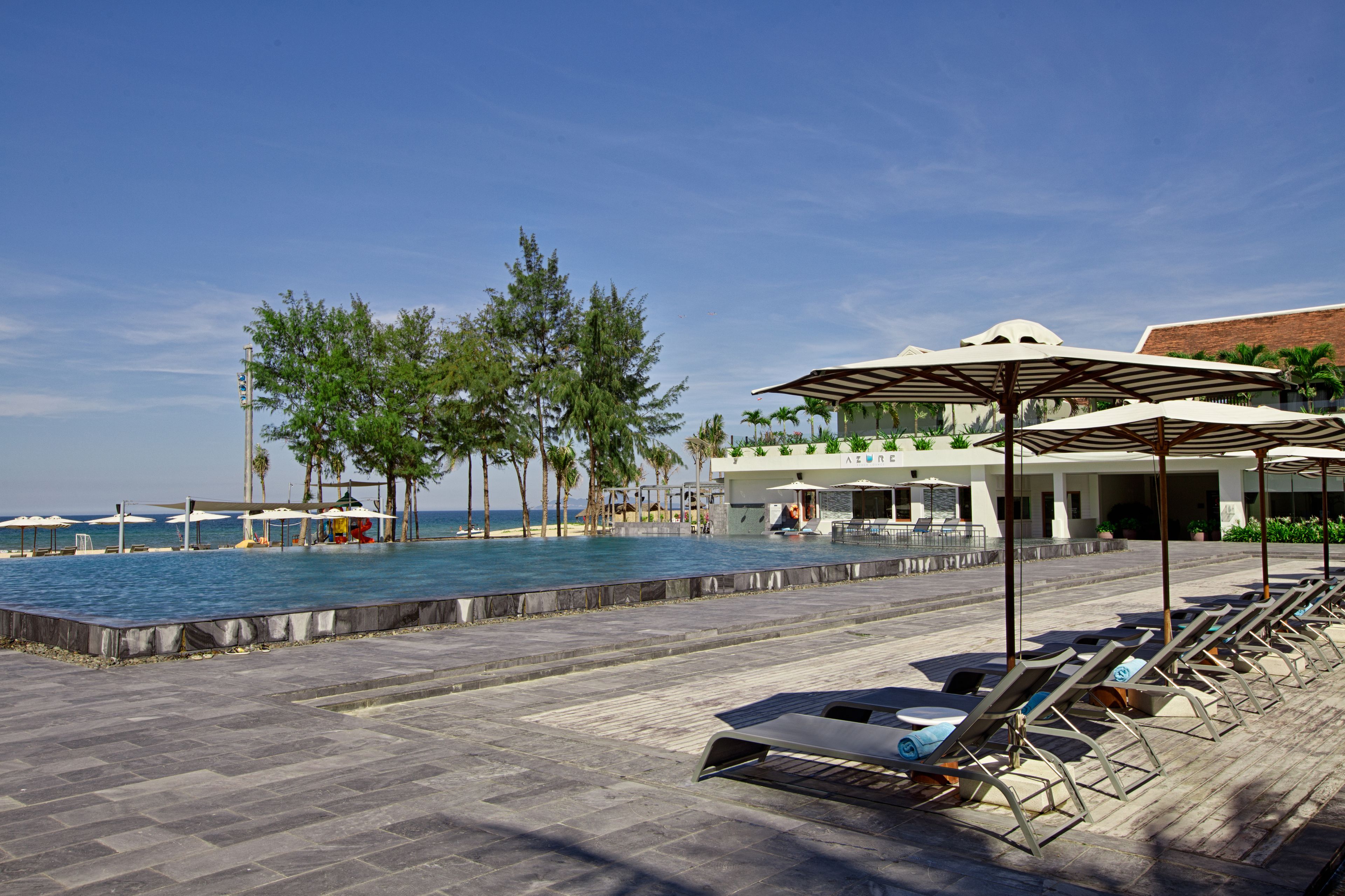 outdoor pool, open 5:00 am to 9:00 pm, pool umbrellas, pool loungers