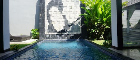 Indoor pool, outdoor pool, pool umbrellas