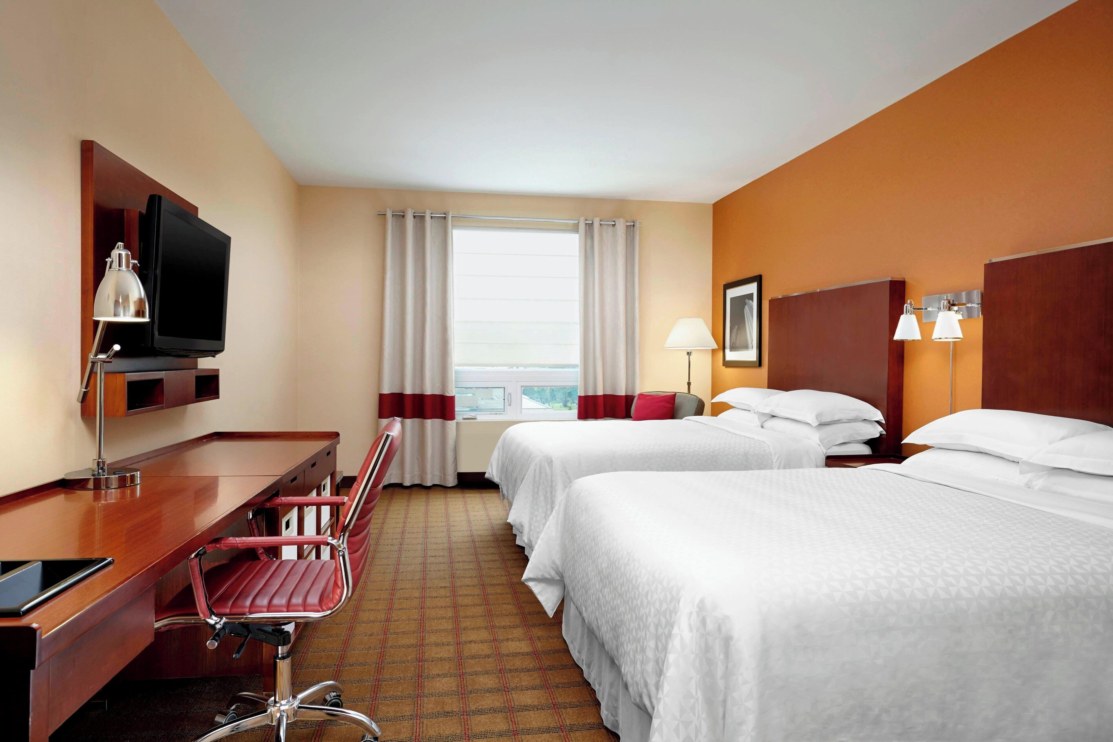 premium bedding, pillow-top beds, in-room safe, individually decorated