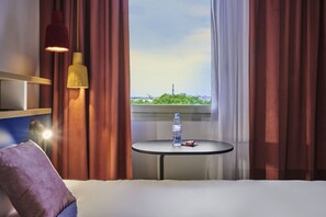 Minibar, bureau, chambres insonorisées, lits bébé (gratuits)
