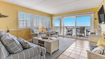 672 Amelia By The Sea | Living area | Flat-screen TV