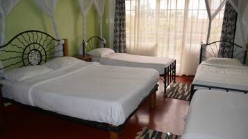 Quadruple Room, Multiple Beds, Private Bathroom | Premium bedding, desk, laptop workspace, iron/ironing board