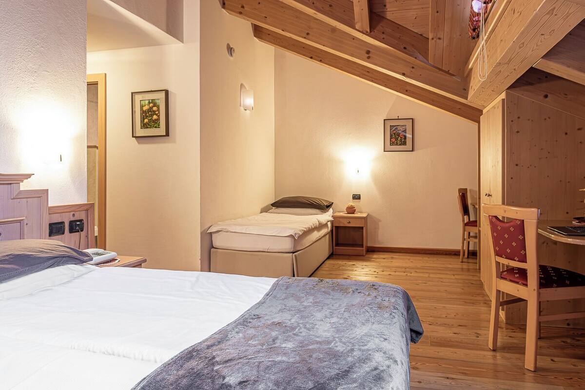 Triple Room | Premium bedding, in-room safe, desk, blackout drapes