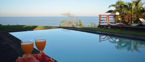 Outdoor pool, pool umbrellas, pool loungers