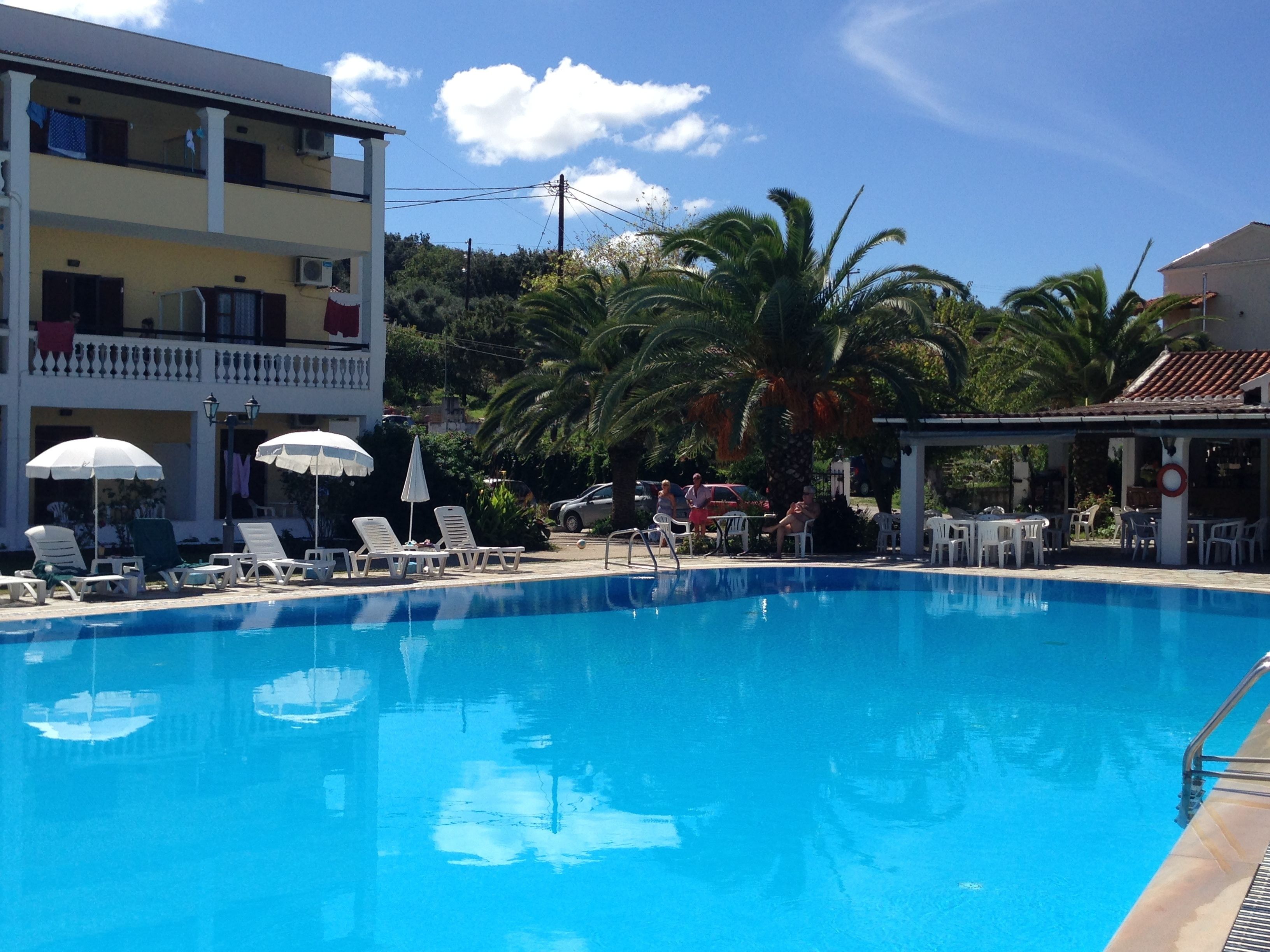 Seasonal outdoor pool, open 9:00 AM to 8:00 PM, sun loungers