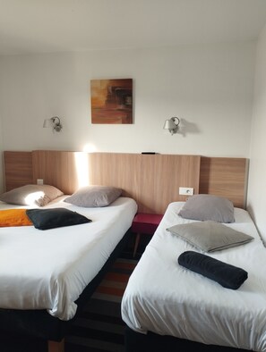 Standardzimmer, Mehrere Betten | Hochwertige Bettwaren, Schreibtisch, schallisolierte Zimmer