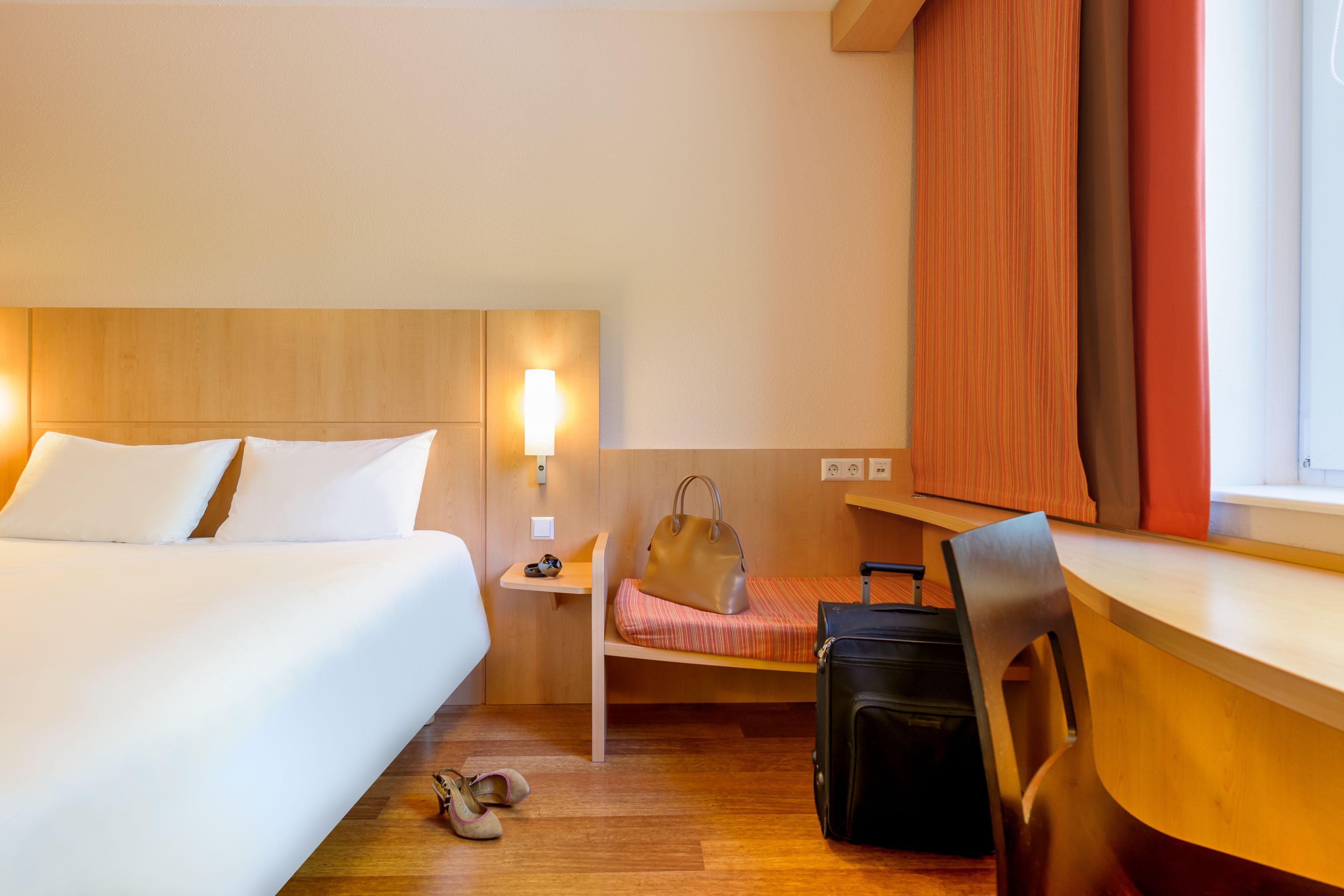 Hypo-allergenic bedding, desk, blackout drapes, soundproofing