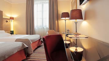 Ropa de cama de alta calidad y minibar