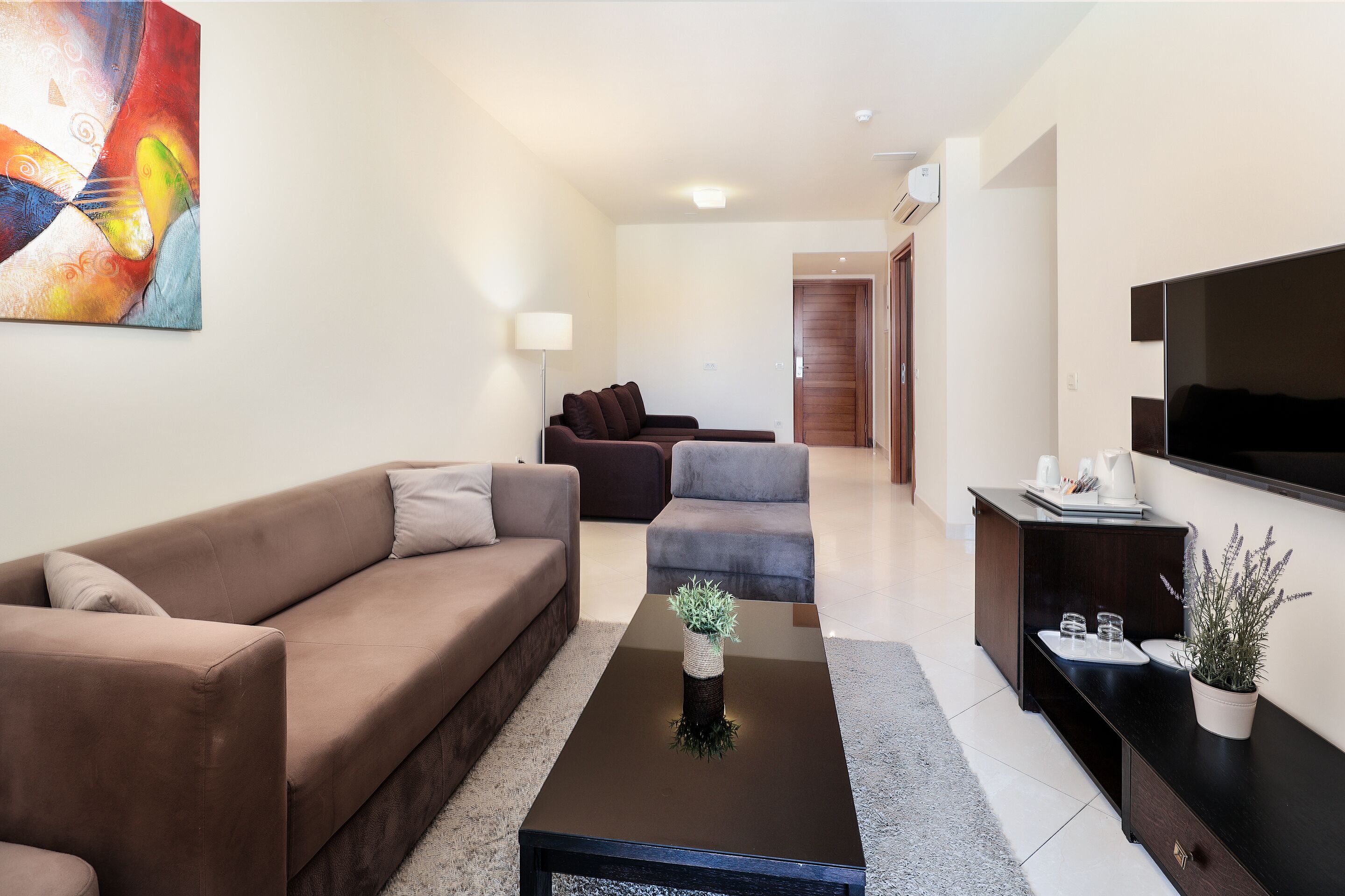 family suite, balcony, sea view (superior) | living area | lcd tv