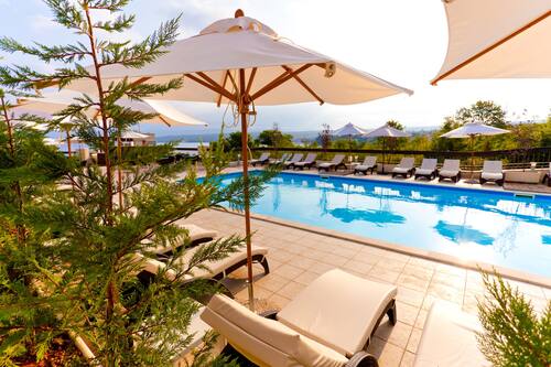 Indoor pool, 2 outdoor pools, pool umbrellas, pool loungers