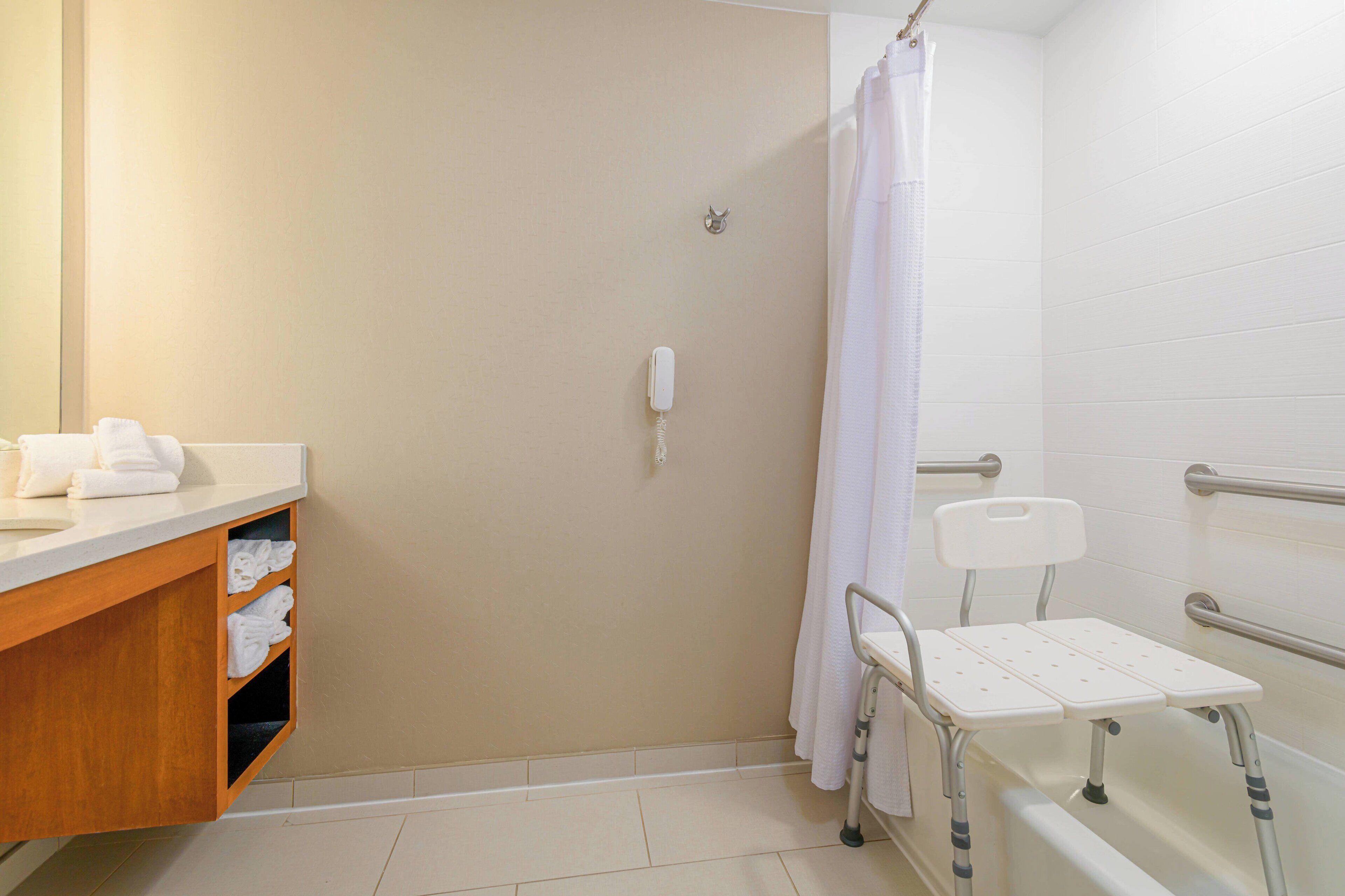 combined shower/bathtub, free toiletries, hair dryer, towels