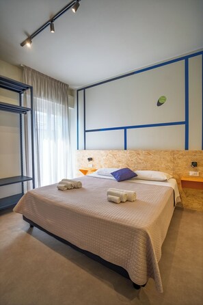 Comfort Quadruple Room | In-room safe, desk, WiFi, bed sheets - Fantini Club Hotel  (Cervia)