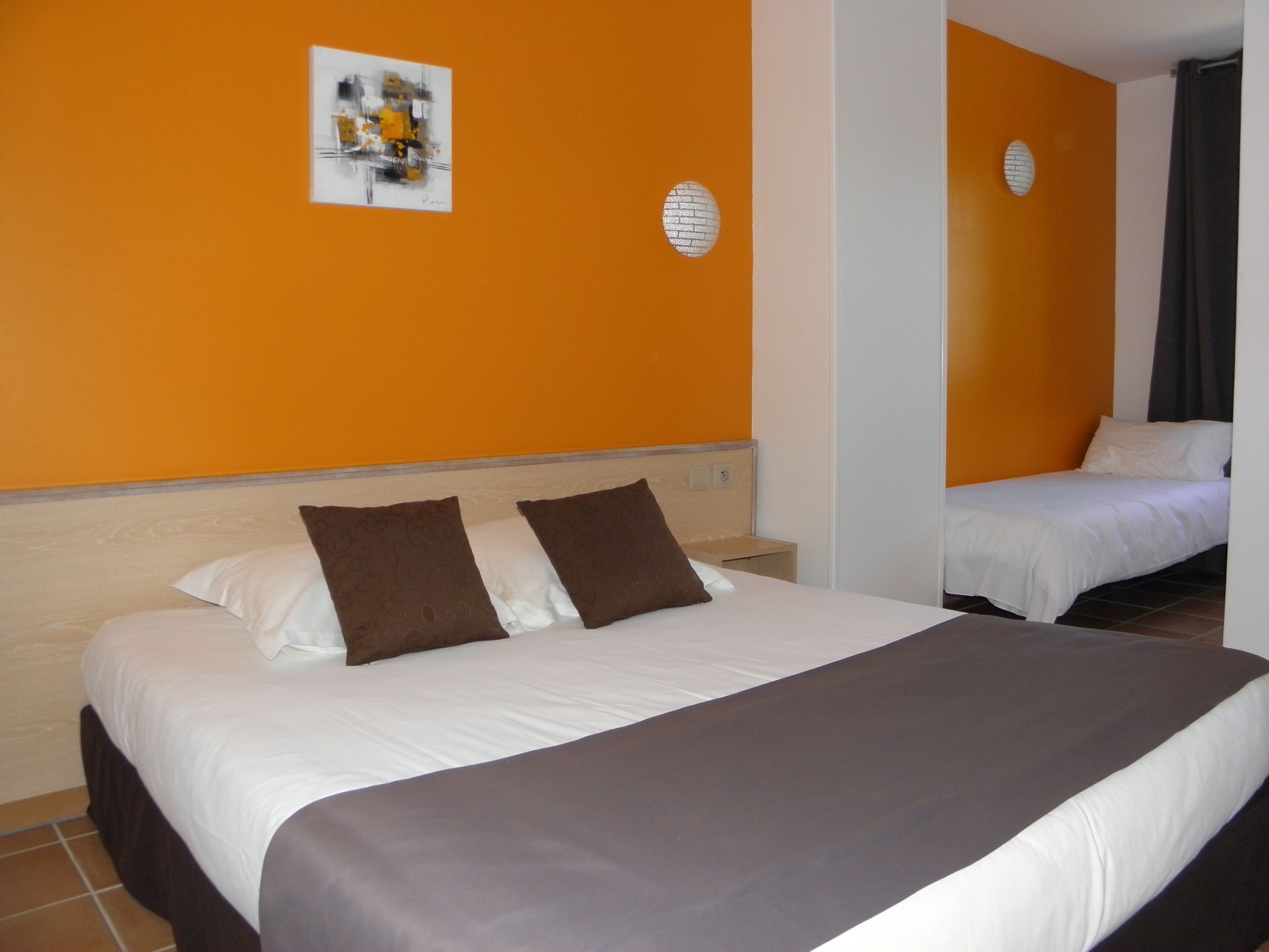 standard triple room | in-room safe, desk, soundproofing, free cots/infant beds