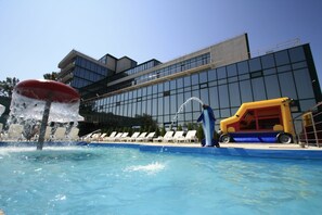 Indoor pool, outdoor pool, pool umbrellas, pool loungers