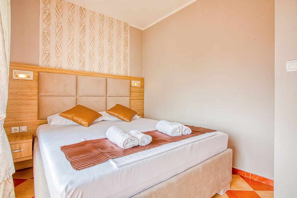 Family Apartment, 2 Bedrooms, Balcony, Sea View | 1 bedroom, desk, blackout curtains, soundproofing