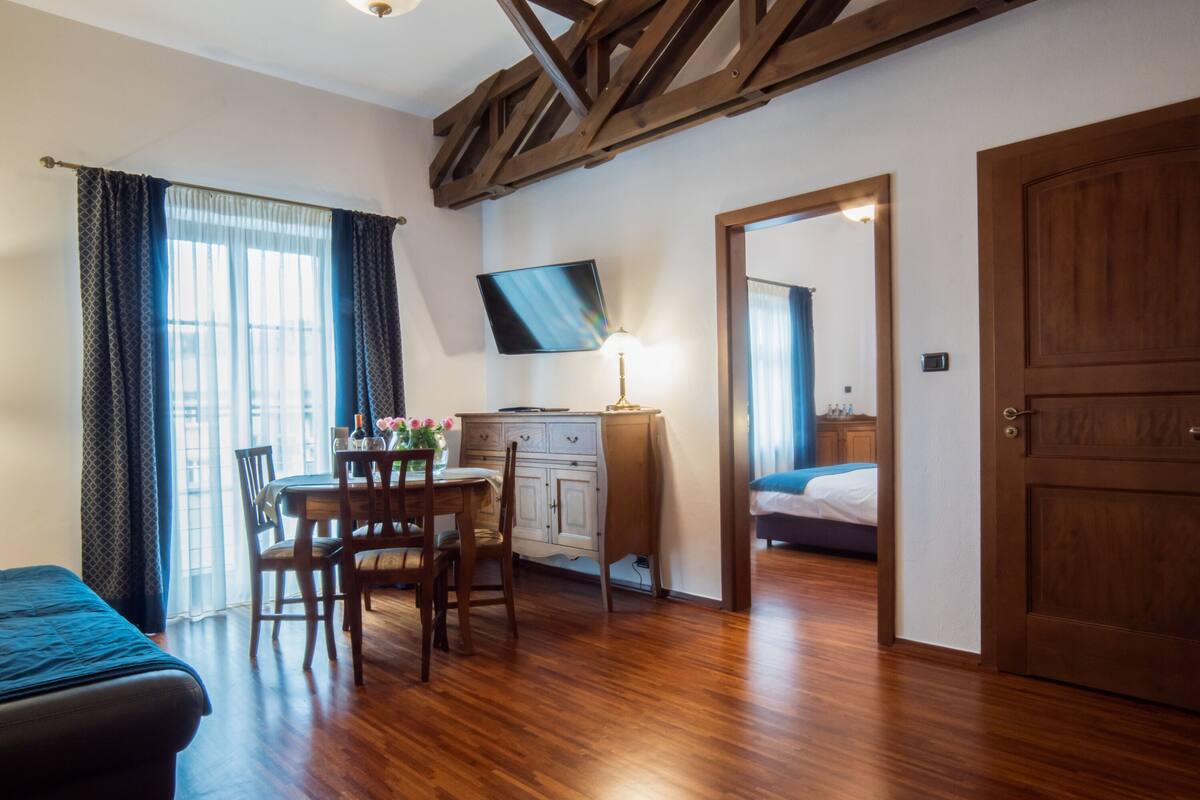 Deluxe Apartment, 2 Bedrooms, Kitchenette | Living room | Smart TV