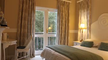 Deluxe Double Room | 1 bedroom, down comforters, pillowtop beds, in-room safe