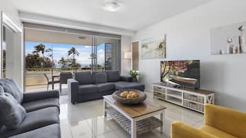 3 Bedroom Ocean View Apartment | Living area | Flat-screen TV, DVD player, ping pong