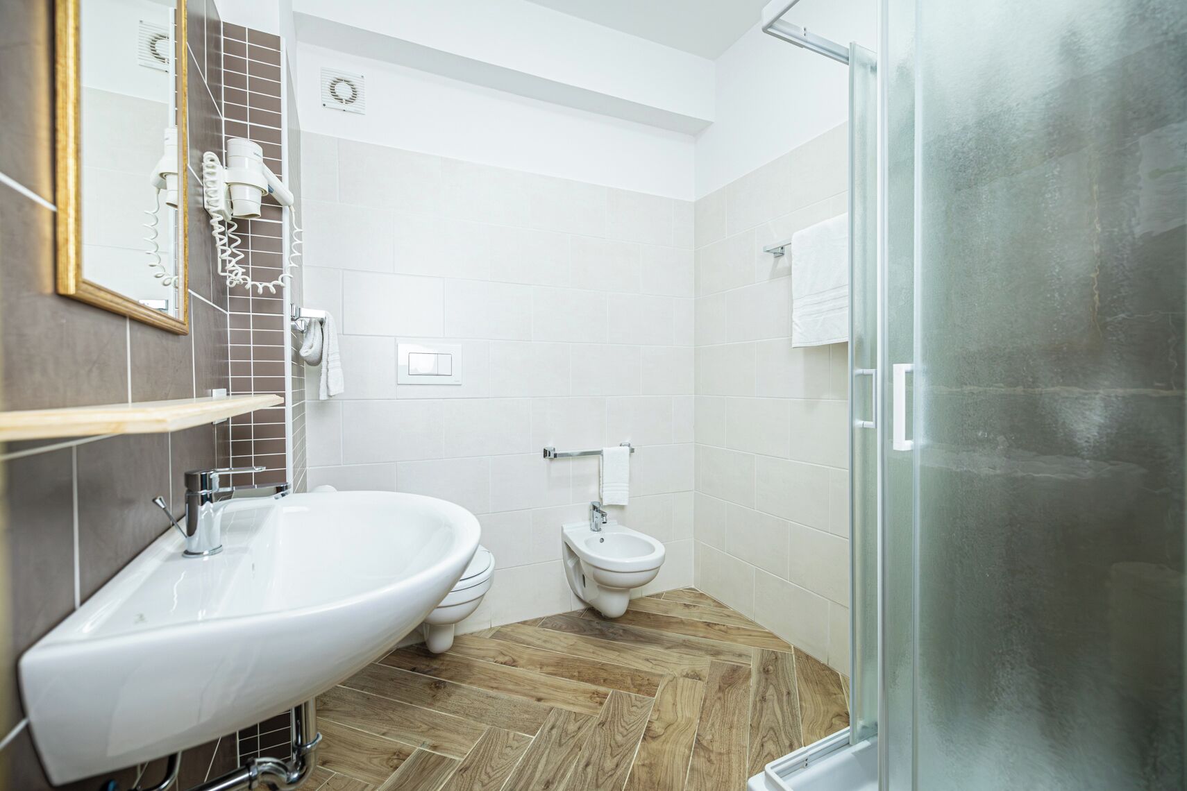 shower, rainfall showerhead, designer toiletries, hair dryer