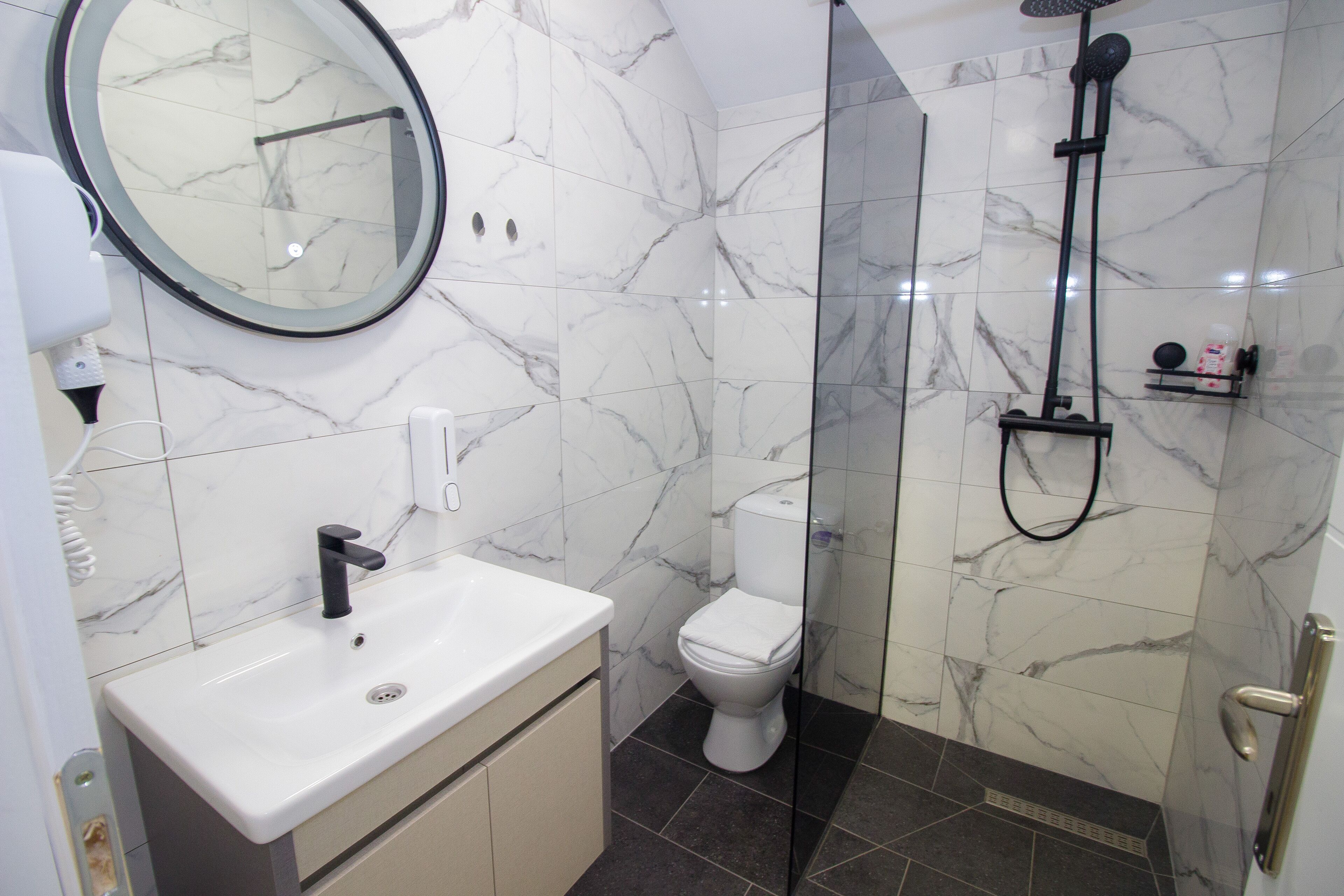 shower, free toiletries, hair dryer, slippers