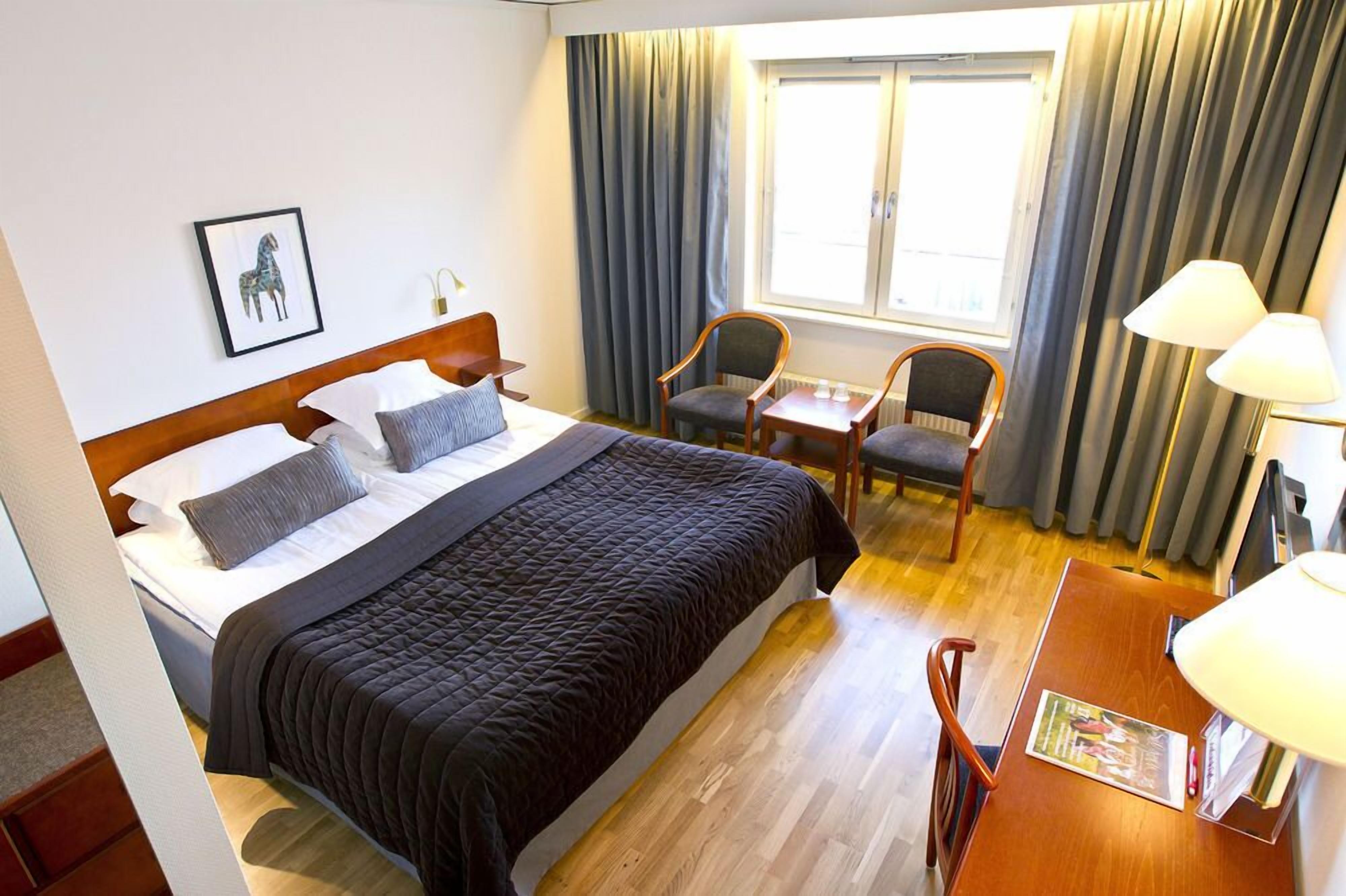 Individually decorated, individually furnished, desk, rollaway beds