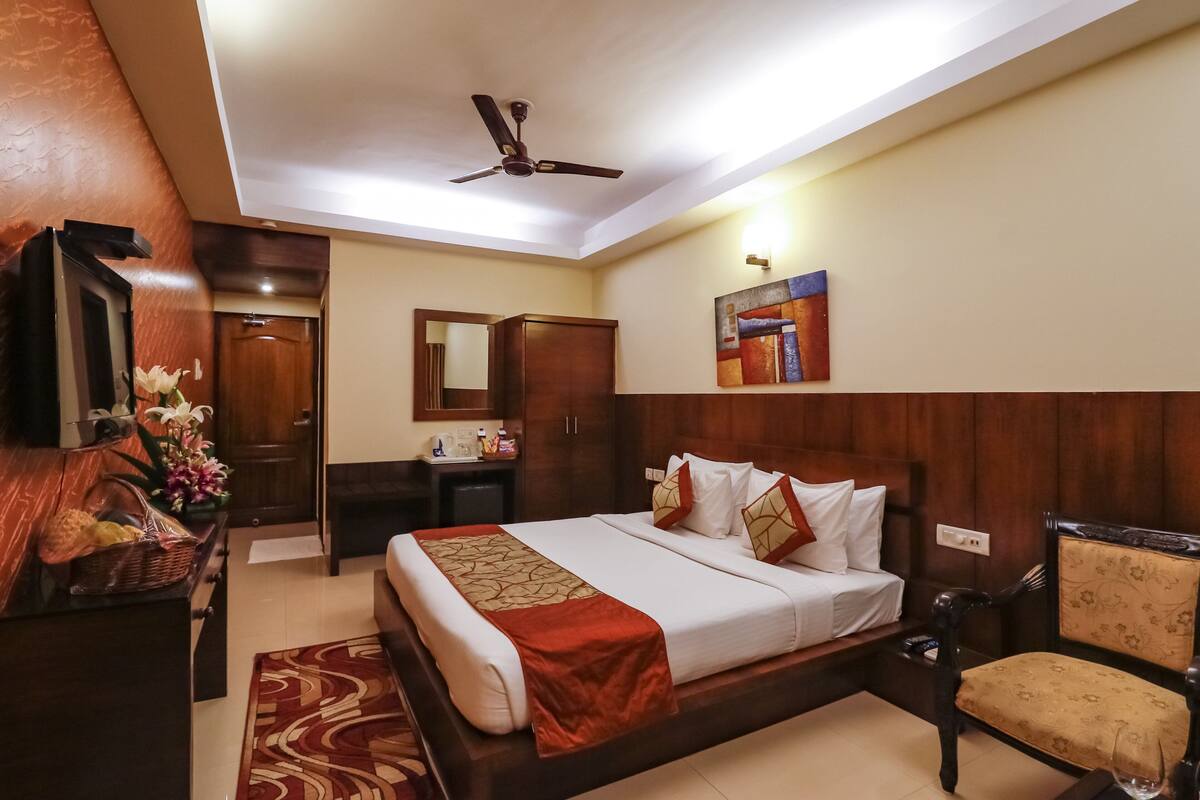 Quarto premium | Camas com colchões de espuma com sistema de memória, frigobar